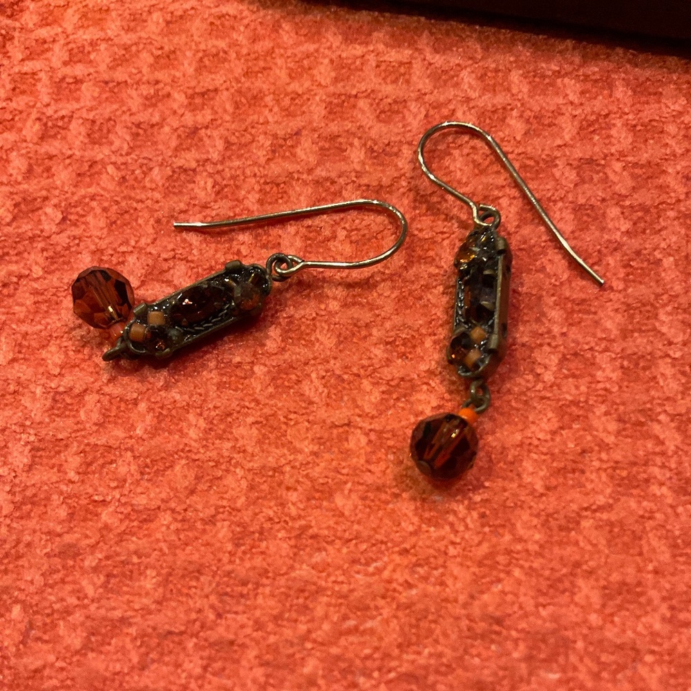 Earrings, pierced